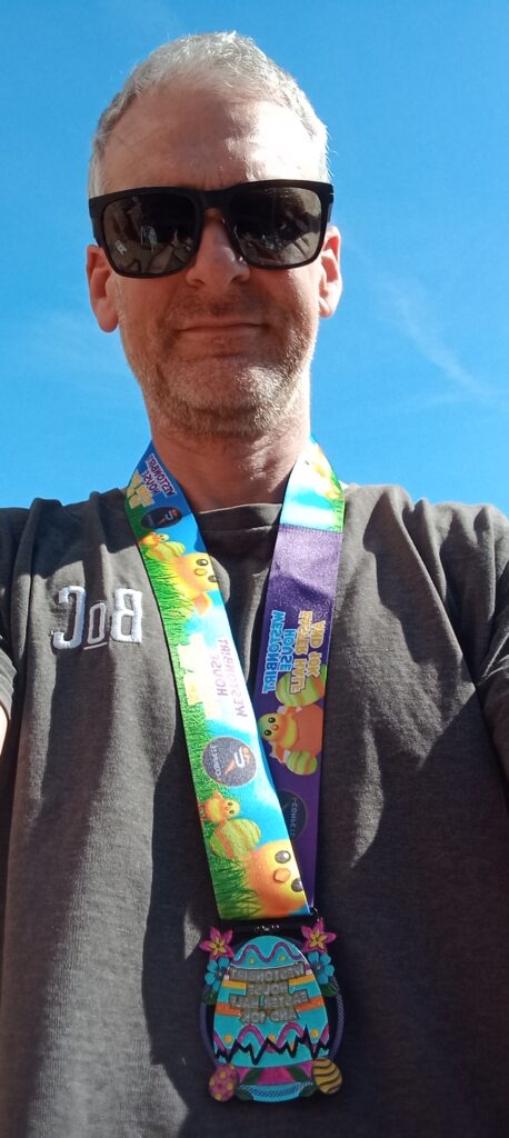 David Kelsey Linchpin Advisory consultant with a running medal